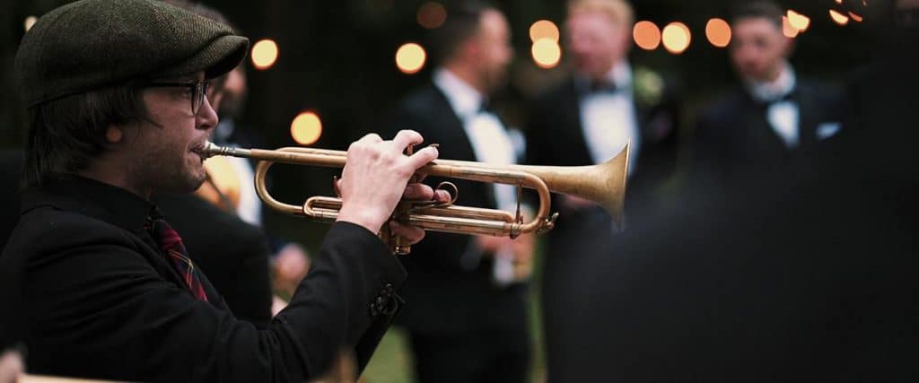 Wedding band at Dewsall Court, New York Brass Band, Herefordshire wedding videographer