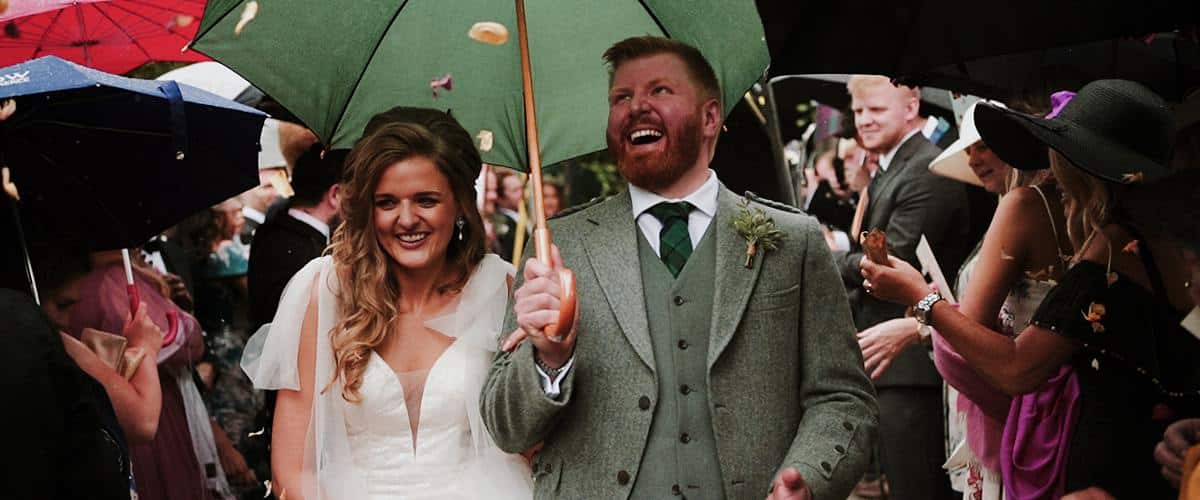 confetti in the rain, wedding videographer in Scotland, Scotland wedding weather,